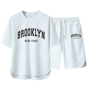 Detail of white men's summer sports set with Brooklyn New York print and knit texture