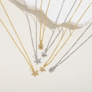 Ocean series gold and silver starfish and shell pendant necklaces with sparkling zircon