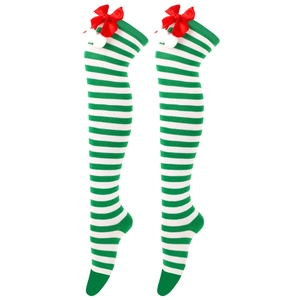 Macro detail of green and white striped Christmas stockings with red bows and white pom-poms