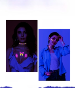 Neon UV glow temporary tattoo stickers with butterfly and geometric patterns on skin