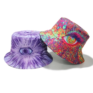 Psychedelic bucket hats with eye pattern and vibrant graphic prints on a white backdrop