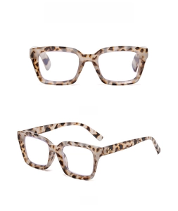 Detail view of grey tortoiseshell square glasses frame with metallic hinge accents