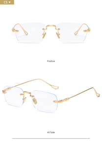 Close-up of golden metal bridge and rimless rectangular lenses on Y2K style eyewear