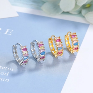 Rainbow baguette zircon hoop earrings in gold and silver plating shown in a pair