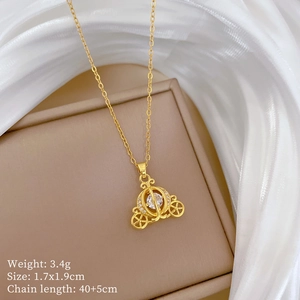 Detailed view of pumpkin carriage pendant with dimensions 1.7x1.9cm and 3.4g weight