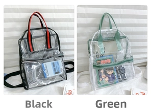 Detail view of transparent PVC backpacks in black and green colors with front zipper pocket