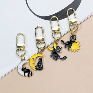 Gothic black cat keychain set with enamel sun and moon charms for bags and keys