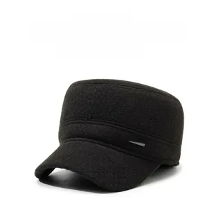 Detailed view of the warm winter cap showing high-density fabric and silver sports emblem