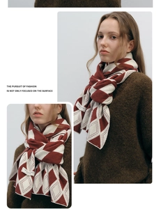 Close-up of red and white diamond knit scarf with premium soft wool texture detail