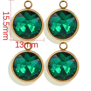 Macro view of green crystal pendants with gold bezel showing 15.5mm by 13mm dimensions