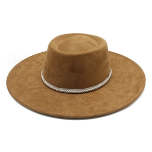 Detailed view of the brown faux suede fedora featuring a luxury pearl and rhinestone band