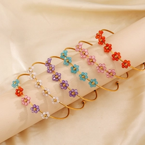 Fashionable woven zircon flower cuff bracelets for women in multiple colors