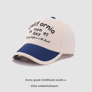 Detail of California Sun print on a contrast color cotton baseball cap for kids