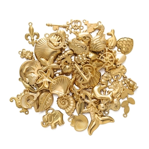 Mix of gold-plated stainless steel marine charms like starfish and shells for DIY jewelry