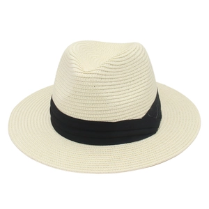 Beige Panama straw hat with a wide black ribbon band for a classic summer look