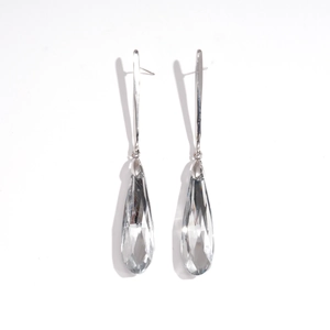 Elegant silver metal drop earrings with faceted clear water drop crystals on white background