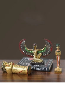 Detailed ancient Egyptian resin figurines of Pharaoh, Isis, and icons in vintage gold finish