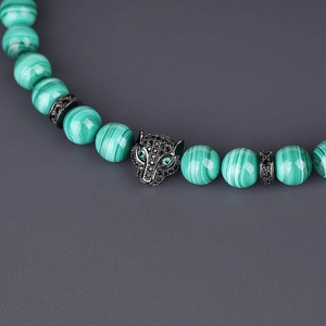 8mm malachite bead bracelet featuring micro-paved black leopard head and green zircon eyes
