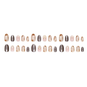 Brown cat-eye press-on nails with champagne glitter and 3D heart charms in oval shape