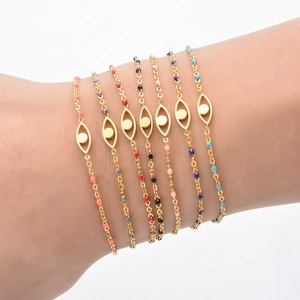 Golden Evil Eye beaded link bracelets for women in seven vibrant assorted colors