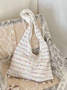 Bohemian crochet tote bag in cream with colorful stripes and shell fringe detail
