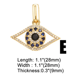 Macro detail of a 28mm golden Evil Eye pendant with blue crystal inlay dimensions