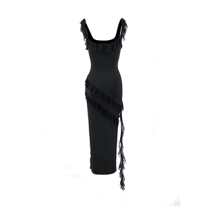 Detail view of black bodycon dress featuring elegant ruffle trim and side slit design
