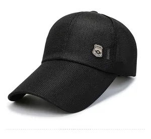 Close-up of breathable black mesh baseball cap showing the side sport shield emblem detail
