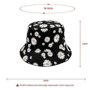 Double-sided daisy bucket hat in black with white floral pattern and sizing details