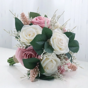 Artificial bridal rose bouquet in white and dusty pink with rustic twine handle