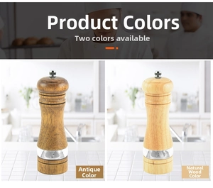 Detail of manual wood pepper mills in antique and natural finishes with acrylic windows