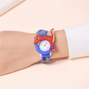 Detailed view of child wearing blue 3D cartoon dinosaur watch with silicone strap