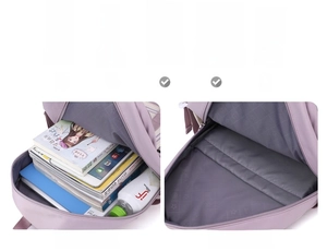 Detail view of large capacity purple backpack with 14-inch laptop compartment and pockets