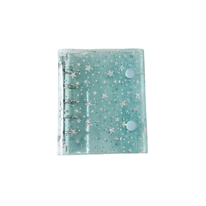 Sparkly mint green M5 PVC binder notebook cover with laser star pattern and dual snaps