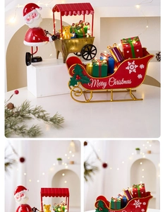 Detail of red metal Christmas train ornaments featuring Santa Claus and gift sleigh