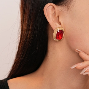 Vintage burgundy rectangle crystal earrings with golden beaded border on female model