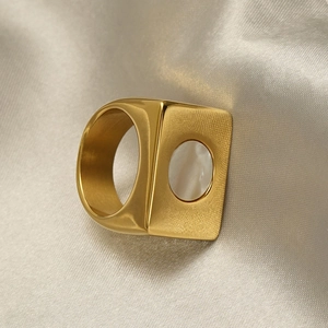Golden geometric wide band ring with mother-of-pearl inlay and brushed finish