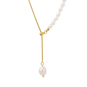 Y-shaped gold snake chain necklace with asymmetrical freshwater pearl tassel pendant