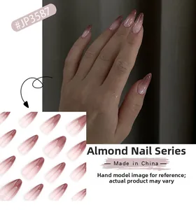 Faux ongles amande à dégradé marron français avec une finition en résine brillante
