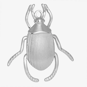 Close-up of a silver 304 stainless steel beetle pendant with a polished metallic finish
