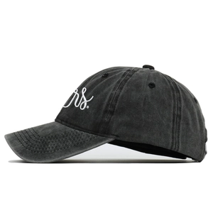 Detail of grey washed cotton baseball cap featuring white Mrs. embroidery and retro finish