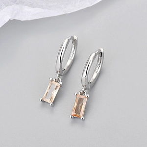 Detailed macro view of S925 sterling silver earring with champagne rectangle zircon stone