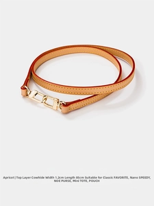 Detail view of 1.2cm apricot top grain cowhide leather strap with gold hardware hooks
