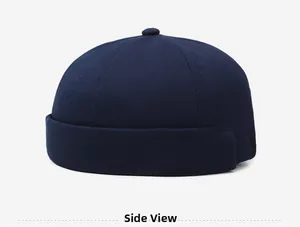 Side view of a navy blue cotton docker hat featuring a minimalist brimless design