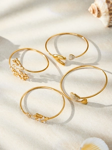 Détails de bracelets nautiques dorés 18 carats avec motifs corail et perles