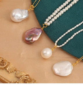 Baroque and round freshwater pearls with gold S925 silver clasps on silk fabric