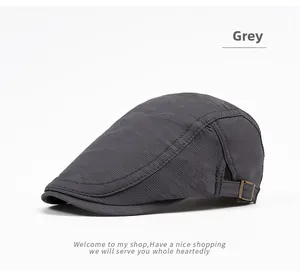 Detail of grey mesh ivy cap with adjustable bronze metal buckle on pure background