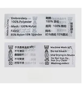 Detailed care label showing 100% polyester and nylon material mix and washing symbols