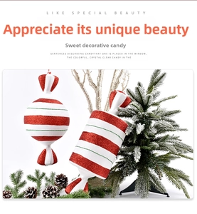 Detail of red and white glitter candy Christmas ornaments with cedar and pine cones background
