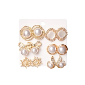 12-piece gold earring set featuring rhinestones, faux pearls, bowknots and snowflakes